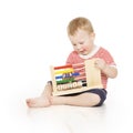 Boy child with abacus clock counting, smart little kid study les Royalty Free Stock Photo