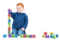 Boy child counting numbers with kids blocks Royalty Free Stock Photo