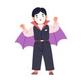 Boy child disguised in carnival costume of Dracula. Cute funny kid wearing Halloween party outfit, spooky clothes