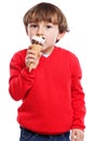 Boy child kid eating licking ice cream summer portrait format is Royalty Free Stock Photo