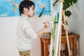 Boy child learning art lesson at preschool - Focus on face Royalty Free Stock Photo