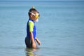 Boy child in a mask with a tube on the beach. children`s swimming lessons . school Kids diving. Royalty Free Stock Photo