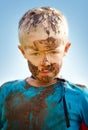 Boy, child and portrait with mud on face from playing, dirt or naughty in summer weather or water. Kid, person or grime Royalty Free Stock Photo