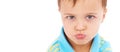 Boy child, sad and studio portrait with mockup space for mental health promotion by white background. Kid, face and Royalty Free Stock Photo