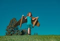 Boy child with wings at sky imagines a pilot and dreams of flying. Royalty Free Stock Photo