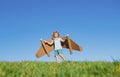 Boy child with wings at sky imagines a pilot and dreams of flying. Royalty Free Stock Photo