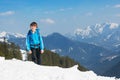 Boy child winter mountain top climbing