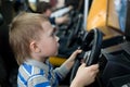 Boy in the children's amusement arcade Royalty Free Stock Photo