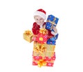 Boy in christmas clothes with toys