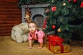 Boy, Christmas tree and gifts Royalty Free Stock Photo