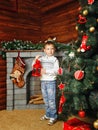 Boy, Christmas tree and gifts Royalty Free Stock Photo