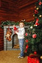 Boy, Christmas tree and gifts Royalty Free Stock Photo