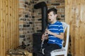 Boy with a clarinet plays music. Online music lesson concept