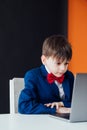 boy in the classroom at the computer online education skype communication Royalty Free Stock Photo