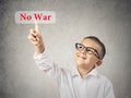 Boy Clicks on No War Button Royalty Free Stock Photo