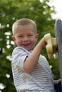 Boy Climbing Rock Wall Outdoors Royalty Free Stock Photo