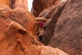 Boy Climbing Rocks in Arches National Park, Utah Royalty Free Stock Photo