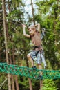 Boy climbing in a rope park Royalty Free Stock Photo