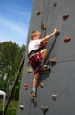 Boy on climbing wall