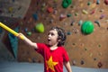 The boy is on the climbing wall. Royalty Free Stock Photo