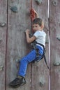 Boy climbing on the wall. Mountaineer