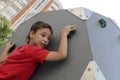 Boy climbing wall Royalty Free Stock Photo