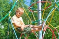 The boy climbs the ropes Royalty Free Stock Photo