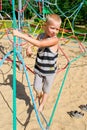 The boy climbs the ropes Royalty Free Stock Photo