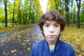 Boy close up outdoor sad unhappy portrait