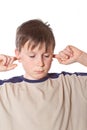 Boy with closed ears
