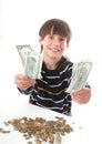 Boy considers money Royalty Free Stock Photo