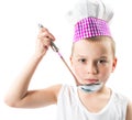 Boy cook wearing chef hat with fresh vegetables and fruits. Royalty Free Stock Photo