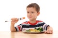 Boy and cooked vegetables