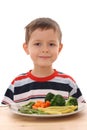 Boy and cooked vegetables