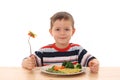 Boy and cooked vegetables