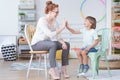 Boy and counselor having fun Royalty Free Stock Photo