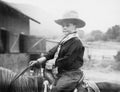 Boy in a cowboy hat on a horse Royalty Free Stock Photo