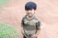 The boy is crying at the amusement park,Children stand in a public place alone blur background,Boys are angry