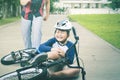 Boy crying while his father trying to help at park Royalty Free Stock Photo