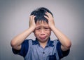 Boy crying over dark background Royalty Free Stock Photo