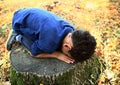 Boy crying in poverty with tears in his eyes stock photo