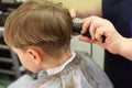 Boy cut in hairdressing salon