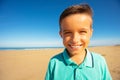 Boy with cute smile on the sea sand beach portrait Royalty Free Stock Photo