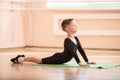 Boy dancer doing exercise at ballet class Royalty Free Stock Photo