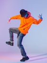 Boy dancing contemporary dance in studio. Breakdancing. Royalty Free Stock Photo