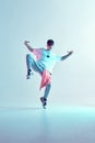 Boy dancing contemporary dance in studio. Breakdancing. Royalty Free Stock Photo