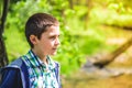 Boy Daydreaming on a sunny day Royalty Free Stock Photo