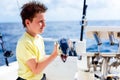 Boy deep sea fishing Royalty Free Stock Photo