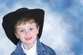 Boy in Denim Jacket and Black Cowboy Hat Royalty Free Stock Photo