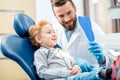 Boy with dentist at the dental office Royalty Free Stock Photo